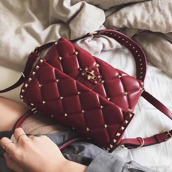 

2018 new sheepskin leather shoulder bag rivet bag portable pgraphic bag color stone shoulderstrap silver burgundy pink love key chain