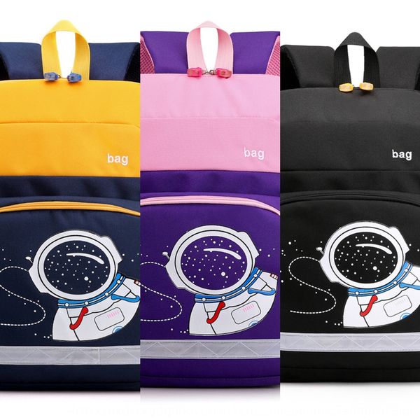

2020 super large capacity school bag primary school students ridge protection for grade one to grade six portable shoulder bag for