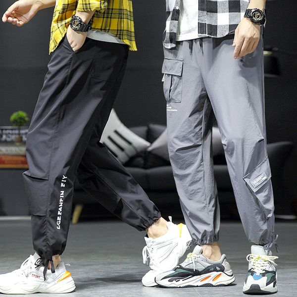

spring and autumn hip hop jogging male black harem pants multi pocket ribbon men's sports pants street casual men's