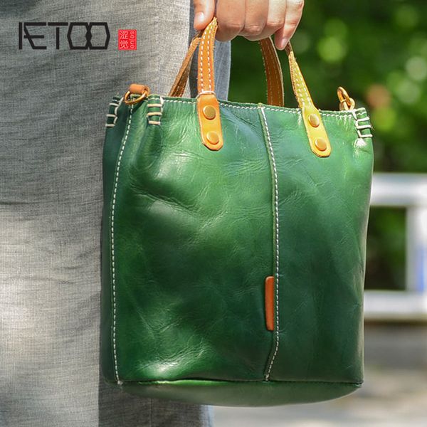 

aetoo handmade leather handbag, simple leather one-shoulder slanted bag, female vintage english wind briefcase