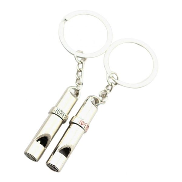 

2x whistles followed whistle child keychain