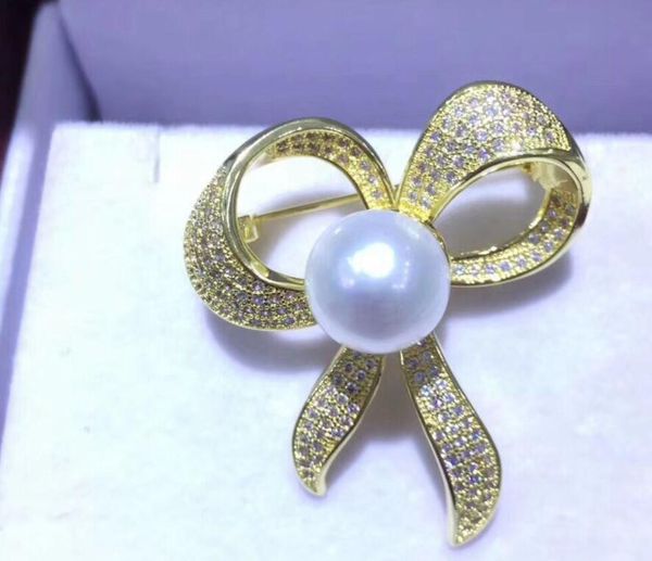 

gt;&gt;&gt;&gt;noble jewelry new design 10-11mm freshwater round pearl crystal bowknot brooches, Slivery;golden