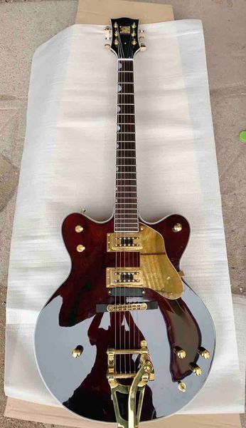 

custom made semi-hollow jazz electric guitar with gold hardware in wine brown
