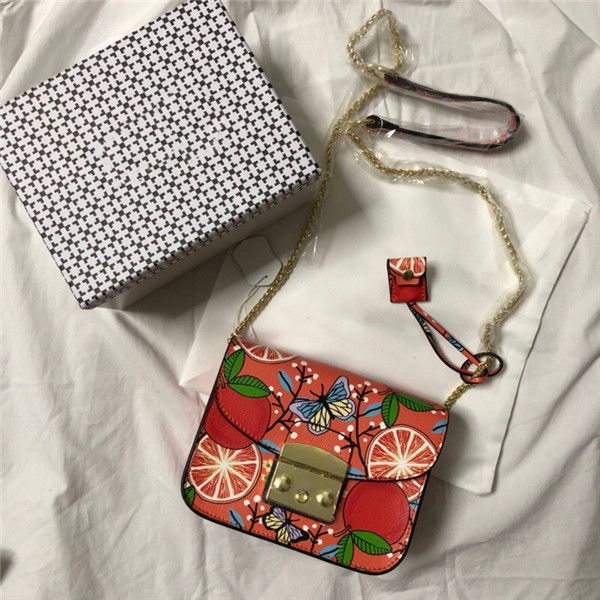 

новая мода дамы кожа небольшой квадратный мешок милые девушки печататься цепи плечо мешок мультфильм оранжевый граффити сумка