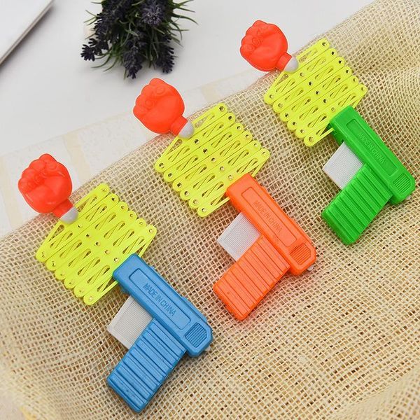 

classic elastic telescopic fist retractable fist shooter trick stress reliever funny game toys for children kids safe plastic