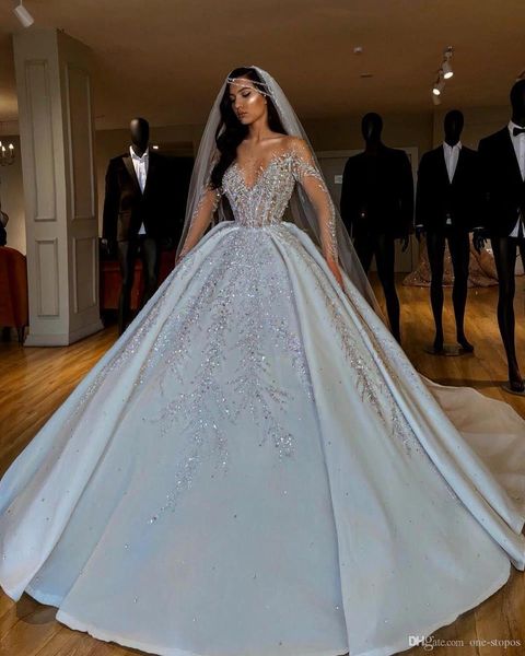 

luxurious sparkly 2019 african wedding dresses sheer neck long sleeves bridal dresses beaded sequins satin wedding gowns, White