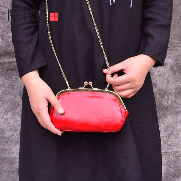 

aetoo genuine leather fashion leather bag female retro solid color oil wax small square bag shell metal chain