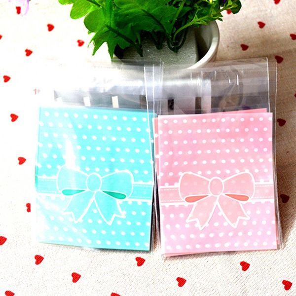 

100pcs 8cm*10cm+3cm cute bow-tie design gift plastic bags cute small biscuit bag party favor cellophane bags