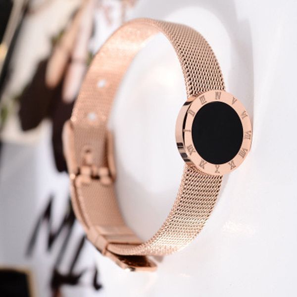 

Anti fading proce of titanium teel ro e gold roman digital black faced bracelet girl