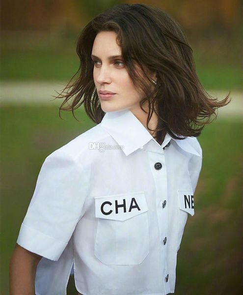 

White hirt female wallowtail pocket letter high wai t hort leeve umbilical hirt factory whole ale blou e blou e