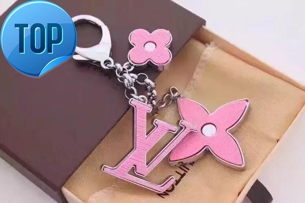 

2019 women men accessories charm key holder key holders bag charms home 2019 acrylic fleur d'epi bag charm m65084, Slivery;golden