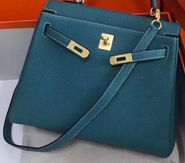 

original design purse with calf skin,blue color with gold and silver metals,size25cm,28cm,32cm,made by machine,fast delivery