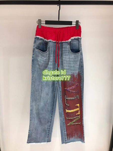 

High end women jer ey luxury de igner denim pant with letter bead girl ca ual pant female runway activewear loo e long trou er 2019