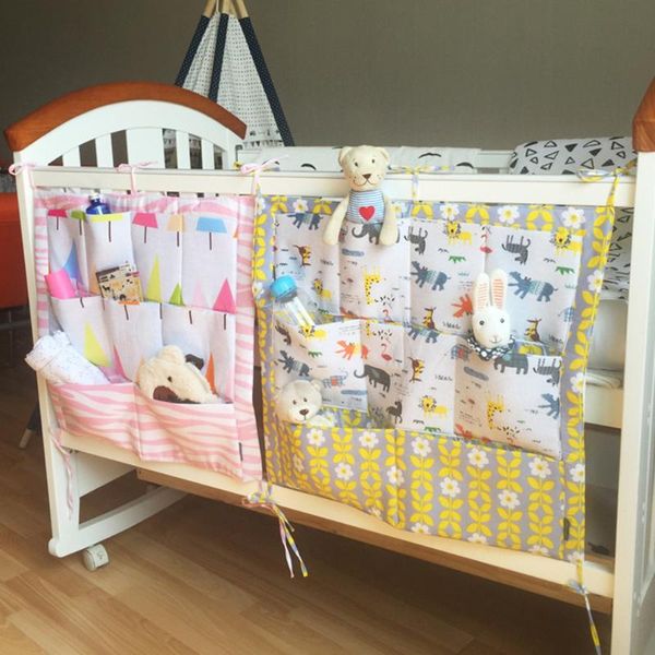 

outad promotion baby cot bed hanging storage bag 100%cotton crib organizer 60*55cm toy diaper pocket for crib bedding sets