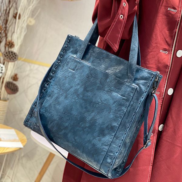 

2019 new fashion women's large capacity briefcase retro leather casual all-around portable messenger bag women