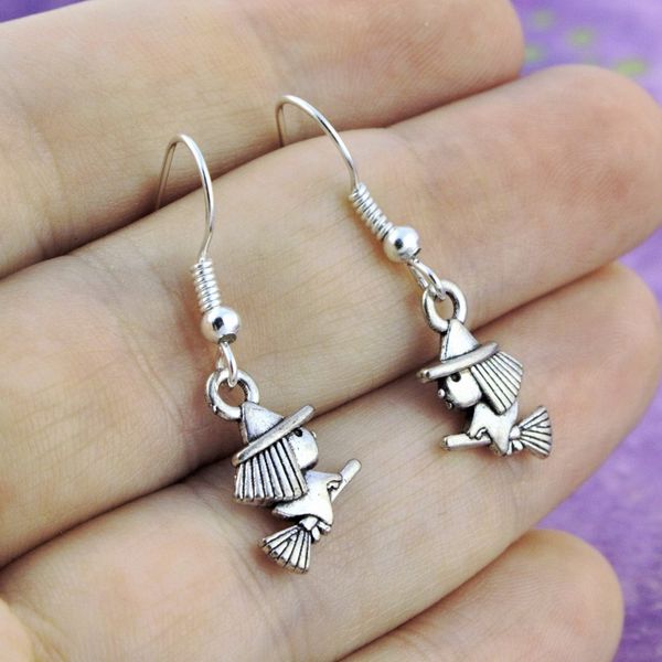 

new ancient silver sorcerer witch riding broom earring ear hook personality creative women jewelry europe united states halloween gift