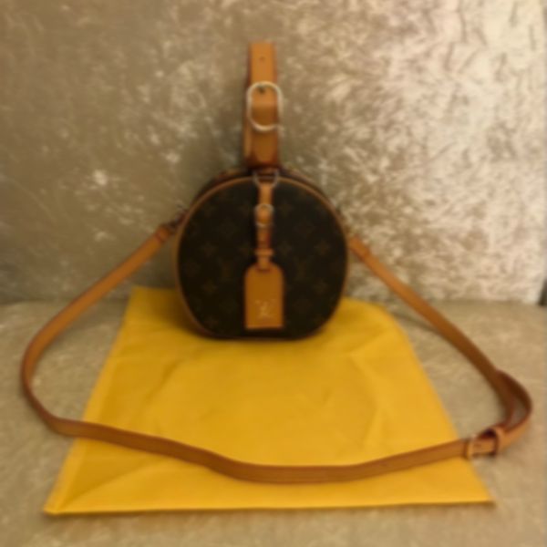 

2019 printed leather women's zipper & hasp handbag small round bag retro slung shoulder bag mini makeup bag tide handbag
