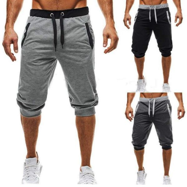 

chrleisure solid loose mens shorts summer breathable elastic waist fitness shorts men's jogging, White;black