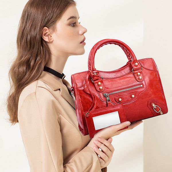 

locomotive small layer genuine leather tassels shoulder woman