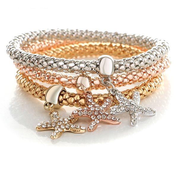 

женщины браслеты роскошные дизайнерские ювелирные изделия, сделанные сплавом со стразами материал эластичный регулируемый звезда рыба подвес, Golden;silver