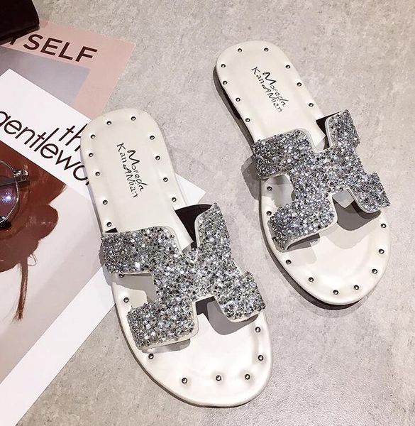 

Fashion rhinestones drag women's summer new Korean version of the flat student beach sandals and slippers slip wear