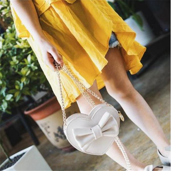

female cross body bags new pure pu leather heart-shaped bowknot shoulder bags fashion ladies' handy traveling handbags women hot