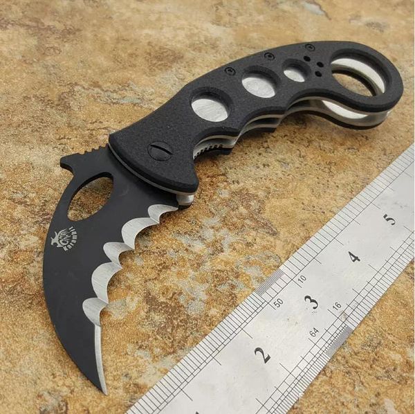 Theone Shark Karambit wellenförmiges Merkmal oder ferngesteuerter Taschenöffner, schwarzes G-10 Figer-Loch, Durchmesser 2,5 cm, Loch, schwarze gezackte Klinge