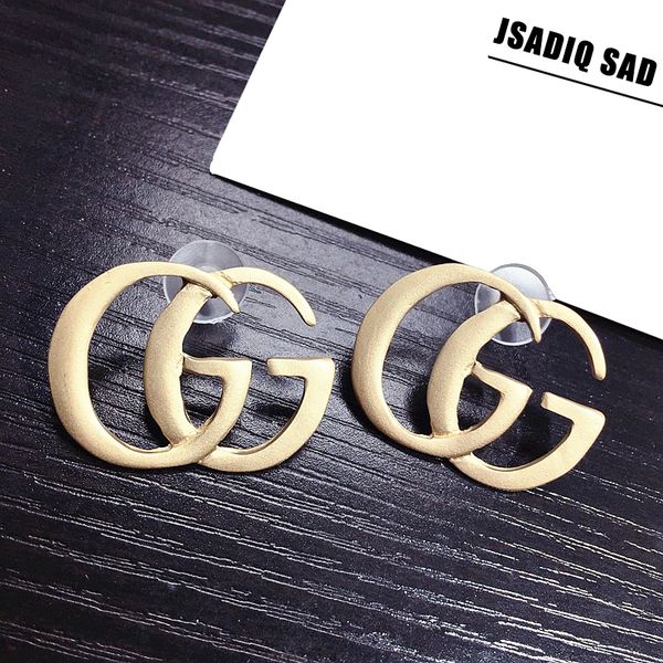 

женщины g золотая серебряная серьга, Golden