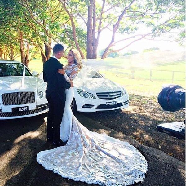 

Sheer Neck Sexy Long Sleeves Wedding Dress lace Appliques Chapel Train Mermaid Wedding Gowns Covered Button African Vintage Bridal Dress