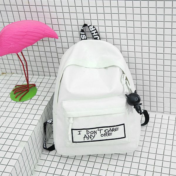 

canvas women backpack with doll pendant fashion female shoulder bag large capacity casual ladies' travel bag mochila harajuku