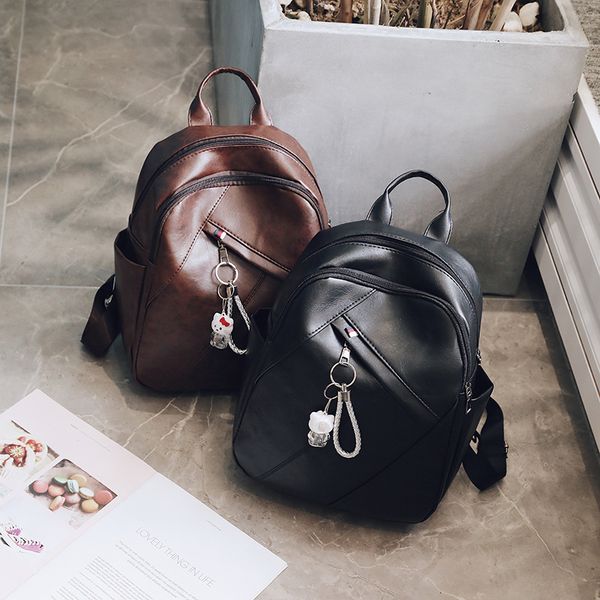 

double shoulder bag woman 2019 new large capacity leather backpack college style black splicing pu leather woman bag tide