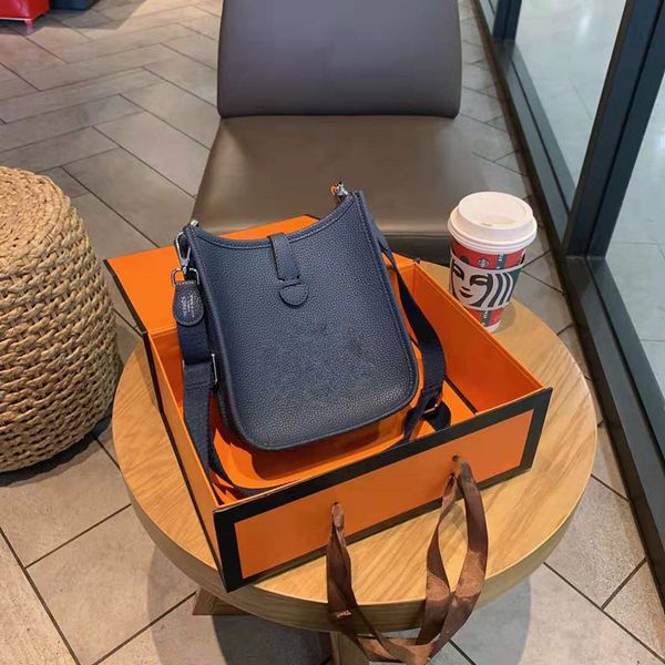 

the new cow genuine leather handbag mini fashion one shoulder bags his hollow out bucket nuzhen women girls female package