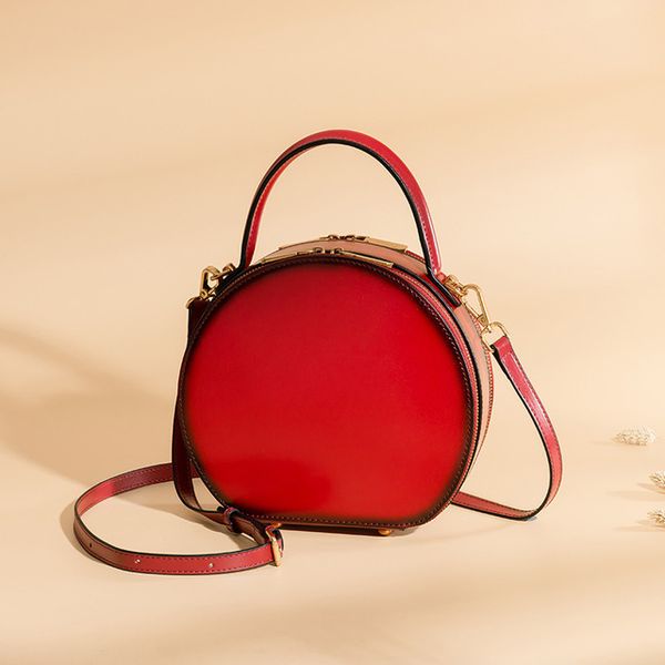 

leather women's bag 2020 new crossbody leather women's bag spring and summer fashion handbag small round bag