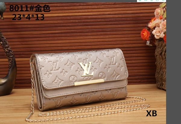 

2018 Lady fashion leather handle beach bag shopping bag chain letter rivet handbag shoulder bag