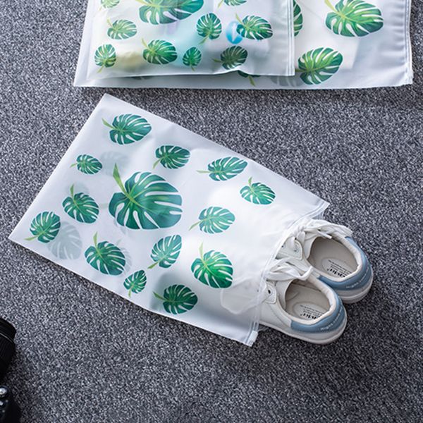 

leaf print transparent travel storage bag plastic package cloth travel storage bag waterproof bag zip suitcase cloth organizer