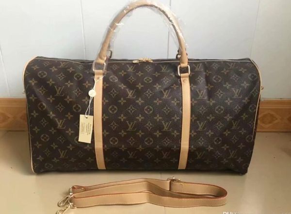 

Men luxury de igner travel luggage bag men tote keepall leather handbag duffle bag ac 2019 brand fa hion luxury de igner bag