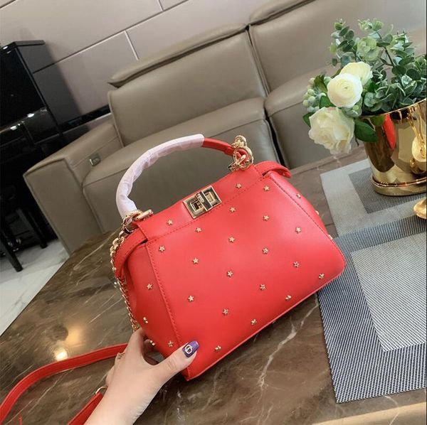 

женская мода марка сумки сумки на ремне для женщин новое прибытие заклепки женщин дизайнер крест тела сумки топы качество сумка #zg