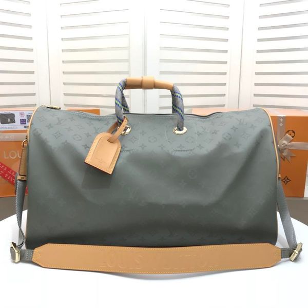 

Large capacity men and women travel bag quality leather men and women houlder baggage bag carry baggage