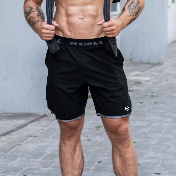 

fashion new men polyester bodybuilding fitness shorts ventilation quick-drying compression gym shorts men, White;black