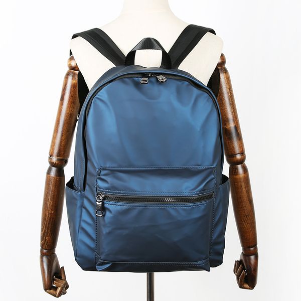 

solid color men's backpack 2019 new fashion men's schoolbag leisure travel women's backpack