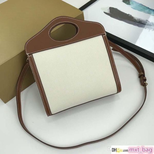 

printed canvas shoulder designer women s bags patchwork with leather handle and strap 23cm b ladies messenger bags 8320