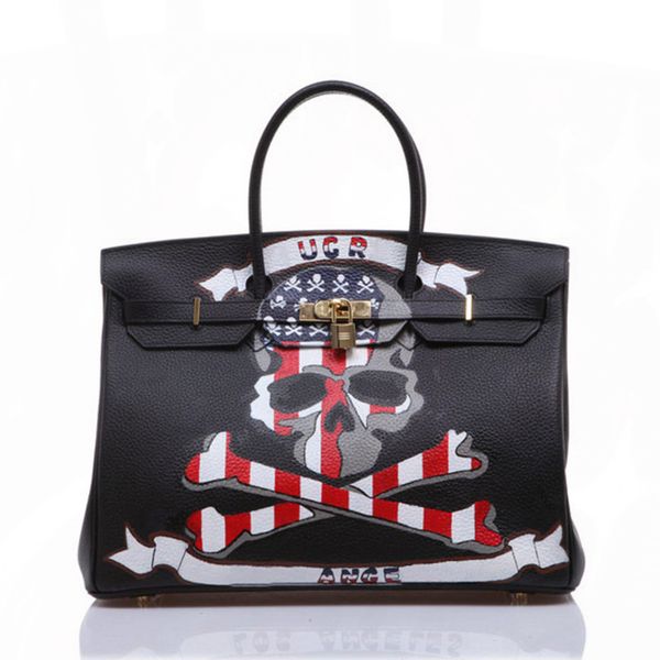 

2020 personalized graffiti handbag skull 25,30,35cm women tote bags genuine leather litchi grain black large capacity bag