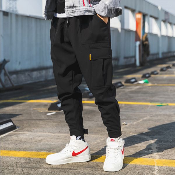 

2020 spring and summer men's black jogging pants new boys solid color beam feet sports pants trousers overalls