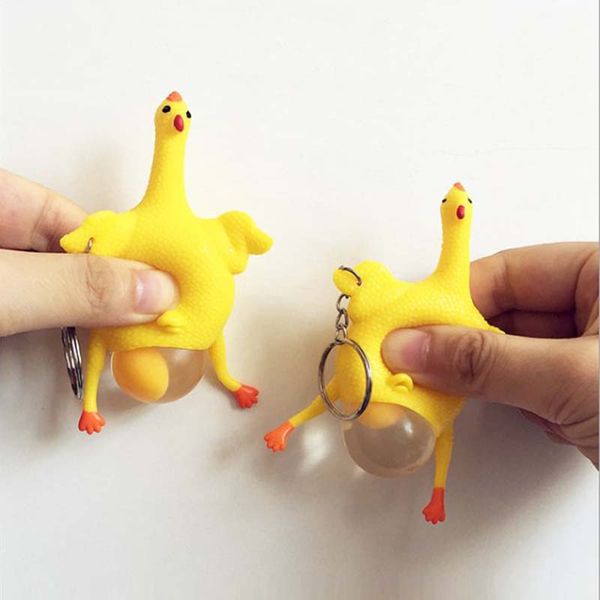 

key rings funny spoof tricky gadgets green dinosaur beans toy chicken egg laying hens crowded stress ball keychain keyring relief gift, Slivery;golden