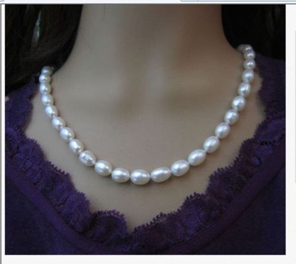 

single strands 10 -11mm baroque white pearl necklace 18"14k/20, Silver