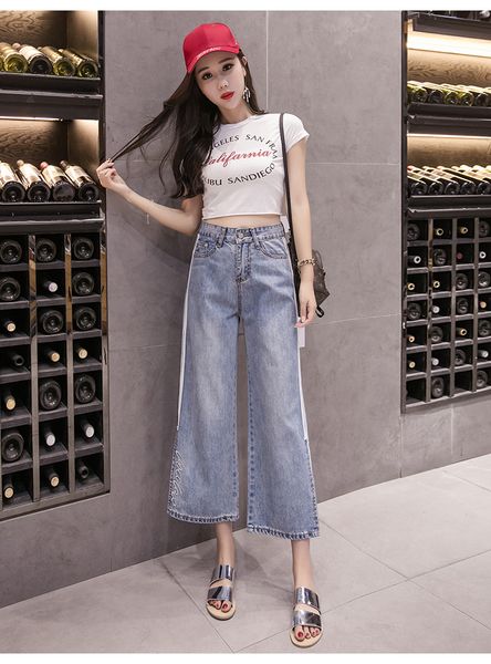 

blue vents of jeans female nine points straight side split