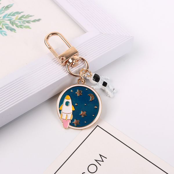 

goldfish wine bottle key ring space craft astronaut rocket planet keychain spaceman universe stars metal keyring key chain gifts, Slivery;golden