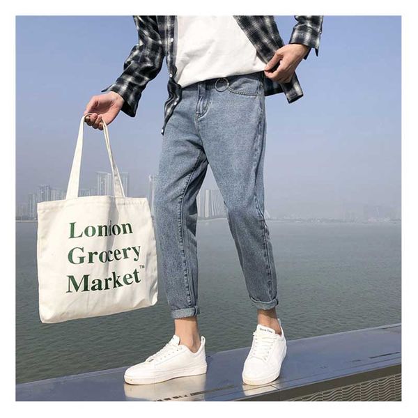 

korean literary men's jeans autumn new men's hole straight straight nine pants spring thin section trend pants slim blue jeans