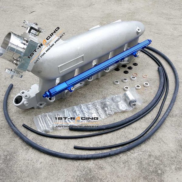 

cast aluminum intake manifold plenum with blue fuel rail for r33 r34 rb25