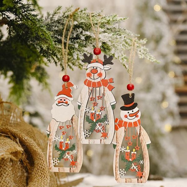Decoração da árvore de Natal de suspensão de madeira oca de Santa do boneco de neve da rena Carve Pendant Ornaments Holiday Party Xmas favores LX2346